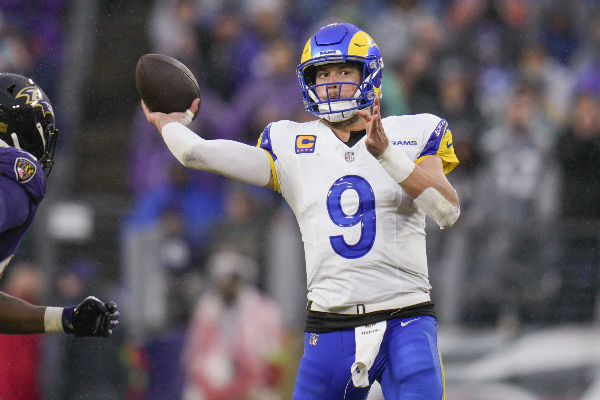 Dec 10, 2023; Baltimore, Maryland, USA; Los Angeles Rams quarterback Matthew Stafford (9) passes against the Baltimore Ravens during the fourth quarter at M&T Bank Stadium.  